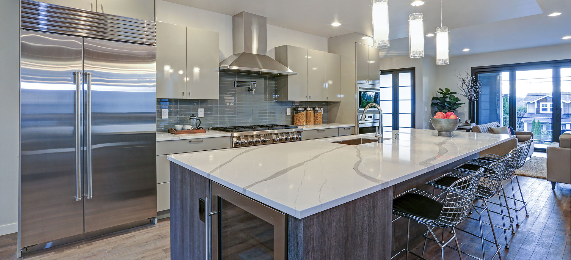 Fabricator inspecting a finished granite countertop edge in the shop